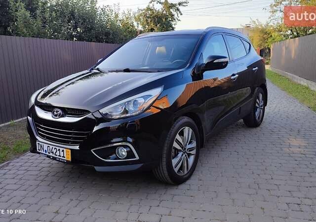 Чорний Хендай іх35, об'ємом двигуна 2 л та пробігом 203 тис. км за 13750 $, фото 28 на Automoto.ua