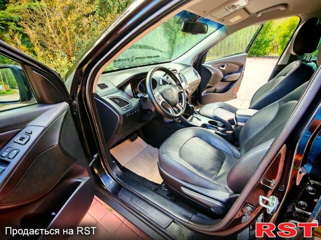 Хендай их35 2014 в Бердичеве на Automoto.ua Черный Хендай их35, объемом двигателя 2 л и пробегом 203 тыс. км за 13850 $, фото 5 на Automoto.ua