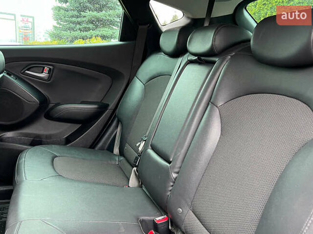 Чорний Хендай іх35, об'ємом двигуна 2 л та пробігом 238 тис. км за 15650 $, фото 19 на Automoto.ua