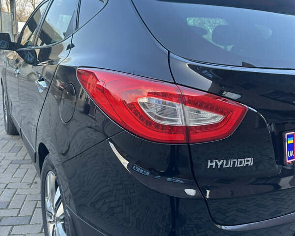 Чорний Хендай іх35, об'ємом двигуна 2 л та пробігом 230 тис. км за 13400 $, фото 10 на Automoto.ua