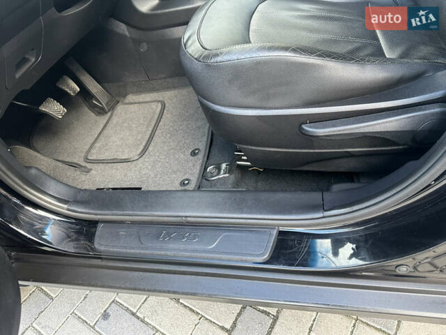 Чорний Хендай іх35, об'ємом двигуна 2 л та пробігом 230 тис. км за 13400 $, фото 59 на Automoto.ua