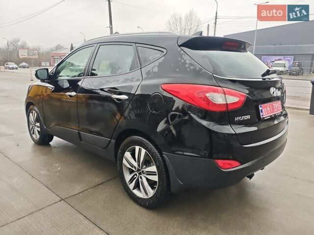 Чорний Хендай іх35, об'ємом двигуна 2 л та пробігом 203 тис. км за 13850 $, фото 11 на Automoto.ua