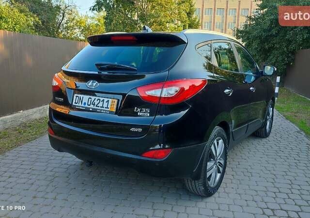 Чорний Хендай іх35, об'ємом двигуна 2 л та пробігом 203 тис. км за 13750 $, фото 27 на Automoto.ua