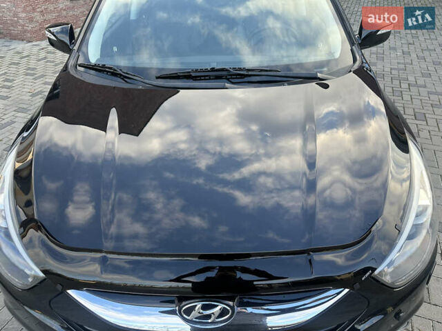 Чорний Хендай іх35, об'ємом двигуна 2 л та пробігом 230 тис. км за 13400 $, фото 75 на Automoto.ua