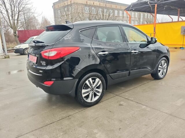 Черный Хендай их35, объемом двигателя 2 л и пробегом 203 тыс. км за 13750 $, фото 1 на Automoto.ua