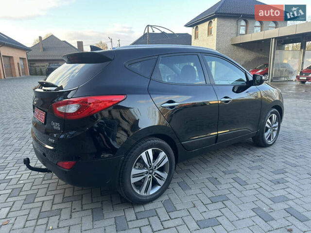 Чорний Хендай іх35, об'ємом двигуна 2 л та пробігом 230 тис. км за 13400 $, фото 4 на Automoto.ua