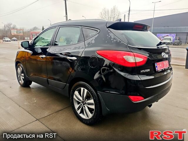 Чорний Хендай іх35, об'ємом двигуна 2 л та пробігом 203 тис. км за 13500 $, фото 6 на Automoto.ua