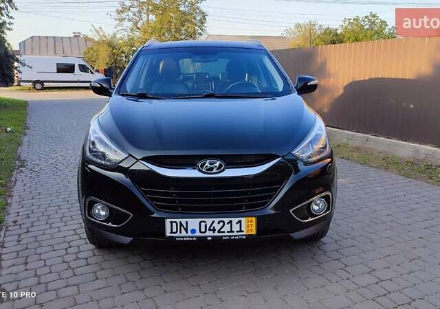 Чорний Хендай іх35, об'ємом двигуна 2 л та пробігом 203 тис. км за 13750 $, фото 30 на Automoto.ua