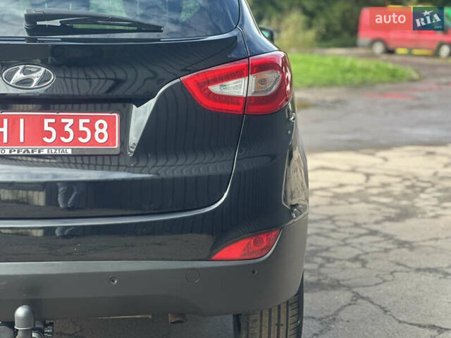 Черный Хендай их35, объемом двигателя 2 л и пробегом 208 тыс. км за 15350 $, фото 11 на Automoto.ua
