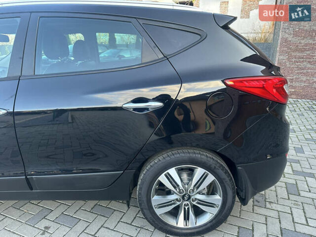 Чорний Хендай іх35, об'ємом двигуна 2 л та пробігом 230 тис. км за 13400 $, фото 25 на Automoto.ua