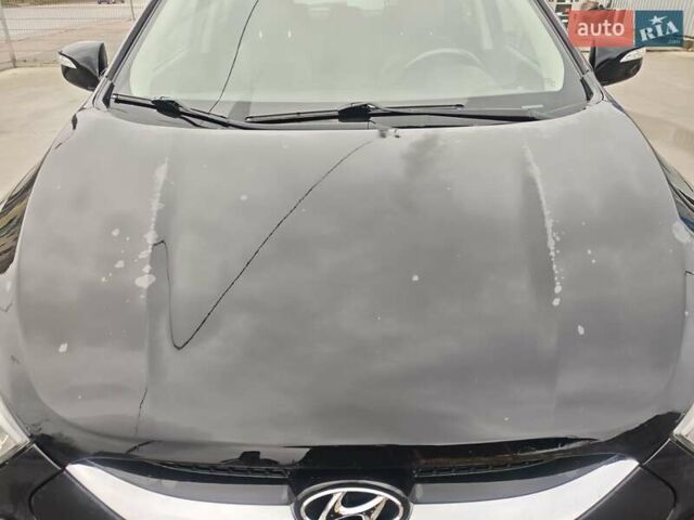 Чорний Хендай іх35, об'ємом двигуна 2 л та пробігом 203 тис. км за 13850 $, фото 18 на Automoto.ua