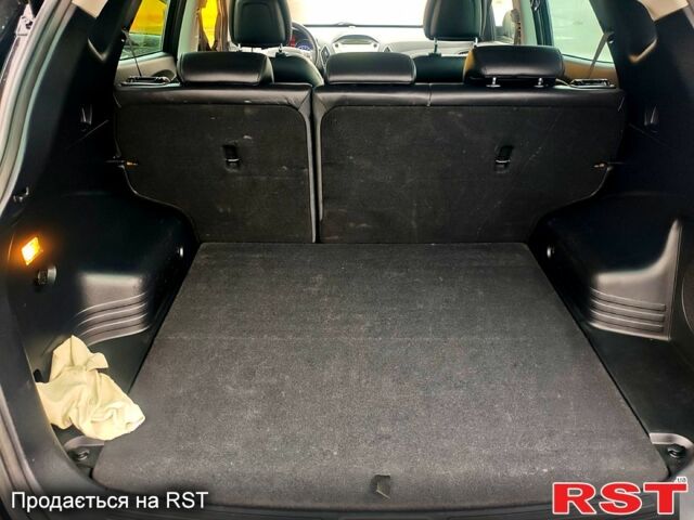 Чорний Хендай іх35, об'ємом двигуна 2 л та пробігом 203 тис. км за 13500 $, фото 10 на Automoto.ua