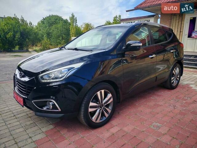 Чорний Хендай іх35, об'ємом двигуна 2 л та пробігом 193 тис. км за 14250 $, фото 26 на Automoto.ua