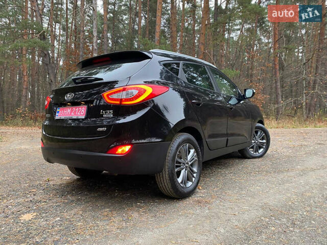 Чорний Хендай іх35, об'ємом двигуна 2 л та пробігом 160 тис. км за 15599 $, фото 11 на Automoto.ua