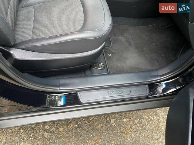 Чорний Хендай іх35, об'ємом двигуна 2 л та пробігом 160 тис. км за 15599 $, фото 59 на Automoto.ua