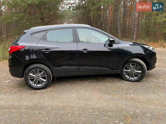 Чорний Хендай іх35, об'ємом двигуна 2 л та пробігом 160 тис. км за 15599 $, фото 30 на Automoto.ua