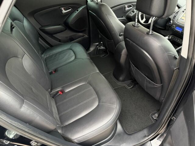 Чорний Хендай іх35, об'ємом двигуна 2 л та пробігом 240 тис. км за 14999 $, фото 7 на Automoto.ua