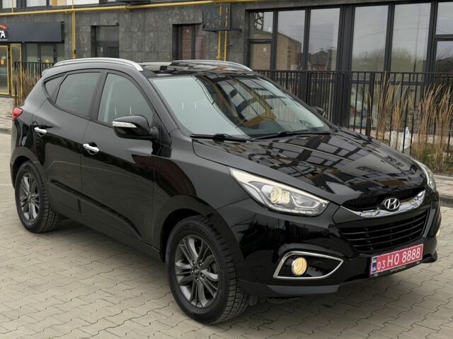 Чорний Хендай іх35, об'ємом двигуна 2 л та пробігом 240 тис. км за 14999 $, фото 4 на Automoto.ua