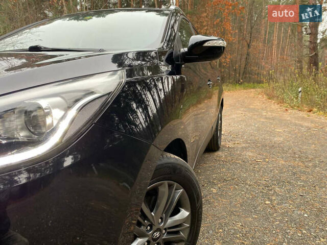Чорний Хендай іх35, об'ємом двигуна 2 л та пробігом 160 тис. км за 15599 $, фото 36 на Automoto.ua