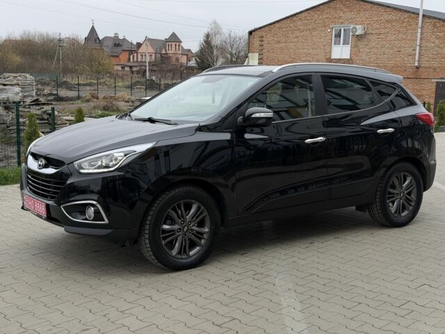Чорний Хендай іх35, об'ємом двигуна 2 л та пробігом 240 тис. км за 14999 $, фото 1 на Automoto.ua