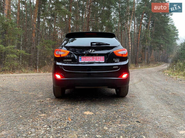 Чорний Хендай іх35, об'ємом двигуна 2 л та пробігом 160 тис. км за 15599 $, фото 13 на Automoto.ua
