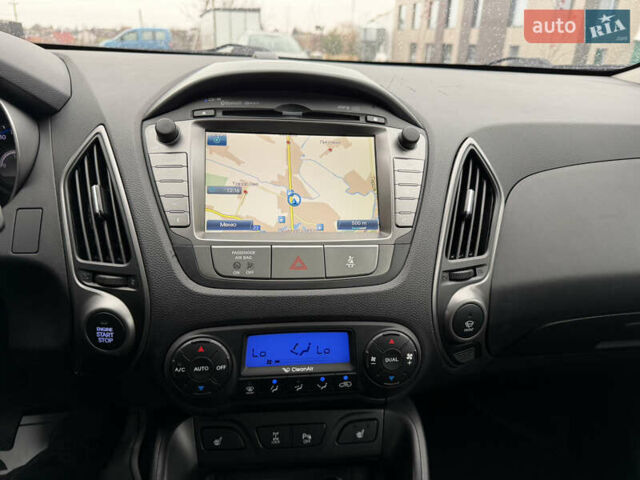 Чорний Хендай іх35, об'ємом двигуна 2 л та пробігом 240 тис. км за 15800 $, фото 35 на Automoto.ua