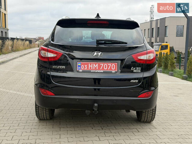 Чорний Хендай іх35, об'ємом двигуна 2 л та пробігом 240 тис. км за 15499 $, фото 4 на Automoto.ua