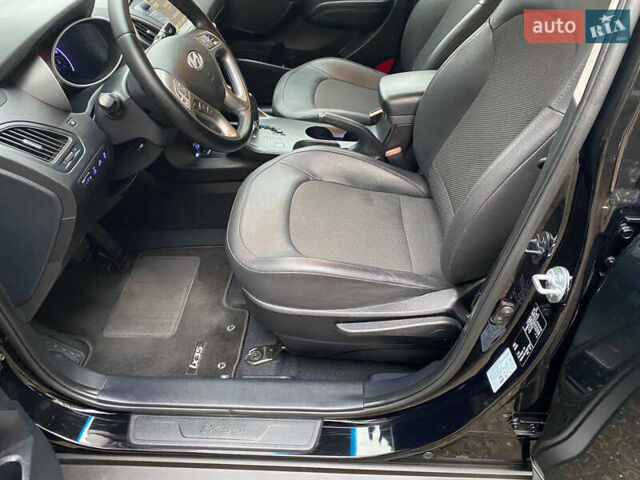 Чорний Хендай іх35, об'ємом двигуна 2 л та пробігом 160 тис. км за 15599 $, фото 48 на Automoto.ua