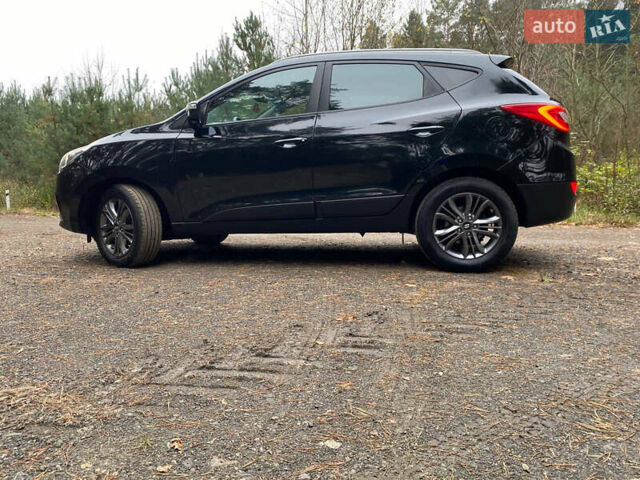 Чорний Хендай іх35, об'ємом двигуна 2 л та пробігом 160 тис. км за 15599 $, фото 6 на Automoto.ua
