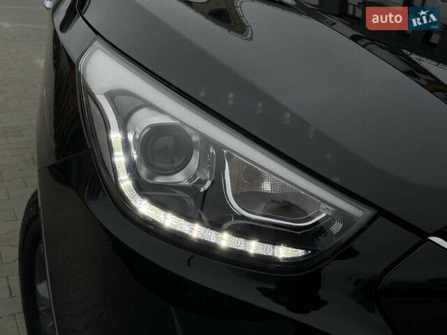 Чорний Хендай іх35, об'ємом двигуна 2 л та пробігом 240 тис. км за 15800 $, фото 7 на Automoto.ua