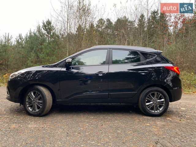 Чорний Хендай іх35, об'ємом двигуна 2 л та пробігом 160 тис. км за 15599 $, фото 7 на Automoto.ua