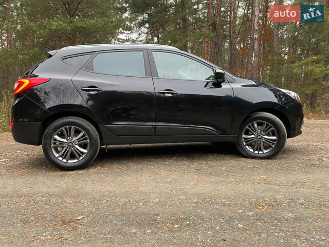 Чорний Хендай іх35, об'ємом двигуна 2 л та пробігом 160 тис. км за 15599 $, фото 15 на Automoto.ua