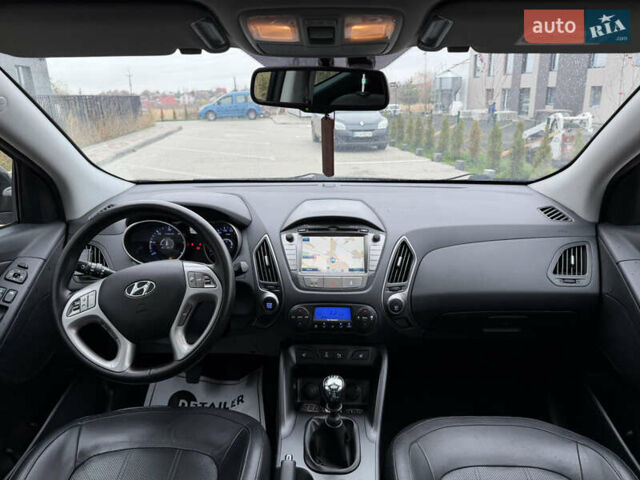 Чорний Хендай іх35, об'ємом двигуна 2 л та пробігом 240 тис. км за 15499 $, фото 14 на Automoto.ua