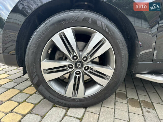 Чорний Хендай іх35, об'ємом двигуна 2 л та пробігом 164 тис. км за 17100 $, фото 52 на Automoto.ua