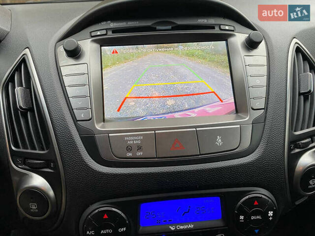 Чорний Хендай іх35, об'ємом двигуна 2 л та пробігом 160 тис. км за 15599 $, фото 65 на Automoto.ua