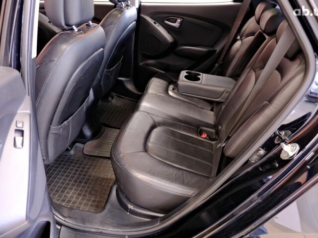 Чорний Хендай іх35, об'ємом двигуна 2 л та пробігом 182 тис. км за 15500 $, фото 7 на Automoto.ua