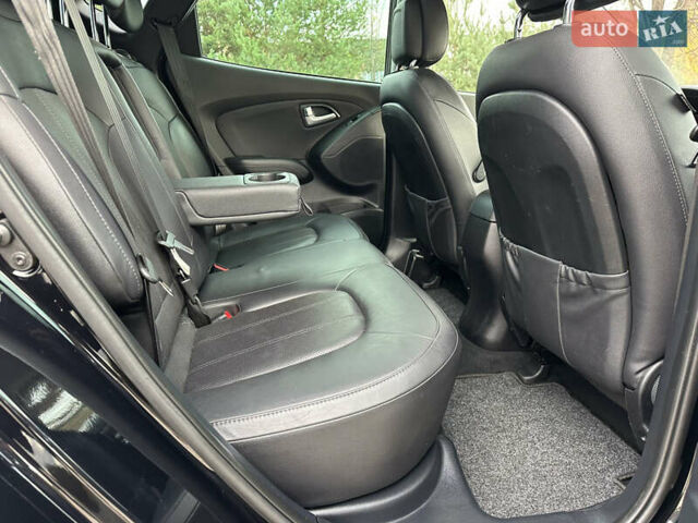 Чорний Хендай іх35, об'ємом двигуна 2 л та пробігом 164 тис. км за 17100 $, фото 19 на Automoto.ua