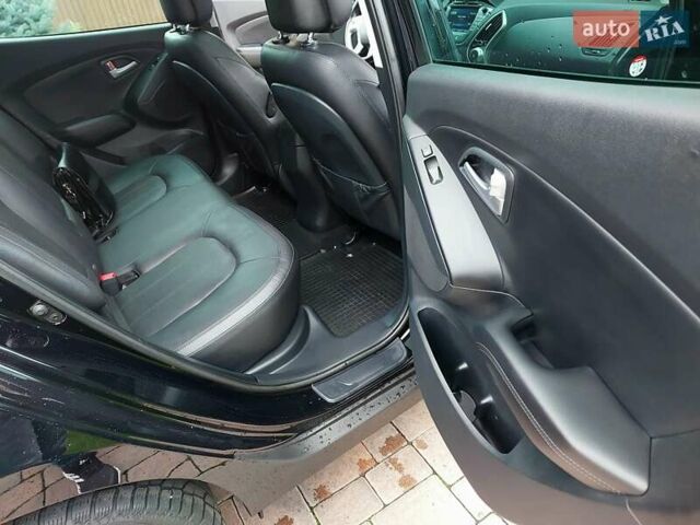 Черный Хендай их35, объемом двигателя 2 л и пробегом 152 тыс. км за 14950 $, фото 35 на Automoto.ua