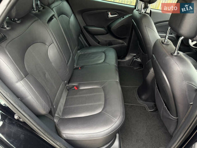 Чорний Хендай іх35, об'ємом двигуна 2 л та пробігом 240 тис. км за 15800 $, фото 26 на Automoto.ua