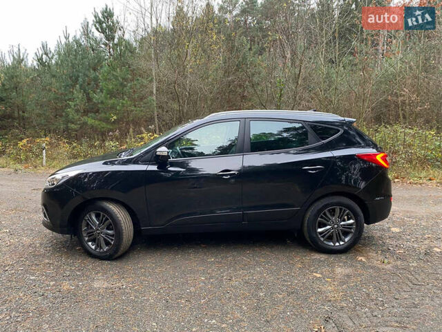 Чорний Хендай іх35, об'ємом двигуна 2 л та пробігом 160 тис. км за 15599 $, фото 4 на Automoto.ua