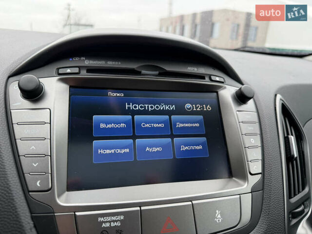 Чорний Хендай іх35, об'ємом двигуна 2 л та пробігом 240 тис. км за 15499 $, фото 26 на Automoto.ua