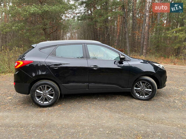 Чорний Хендай іх35, об'ємом двигуна 2 л та пробігом 160 тис. км за 15599 $, фото 14 на Automoto.ua