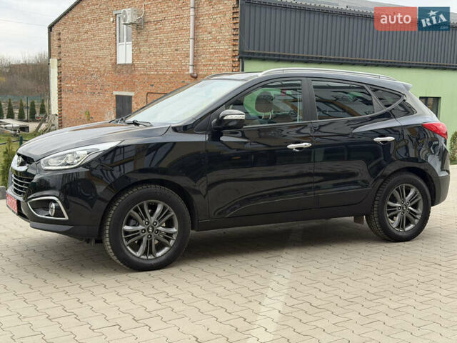 Чорний Хендай іх35, об'ємом двигуна 2 л та пробігом 240 тис. км за 15499 $, фото 1 на Automoto.ua
