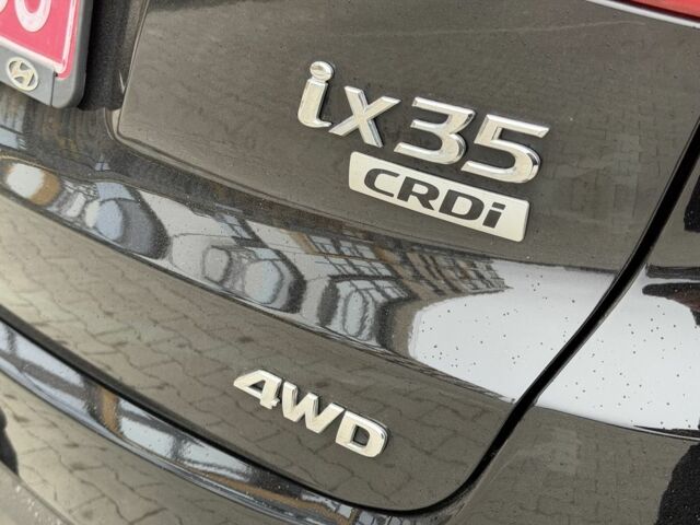 Чорний Хендай іх35, об'ємом двигуна 2 л та пробігом 240 тис. км за 14999 $, фото 5 на Automoto.ua