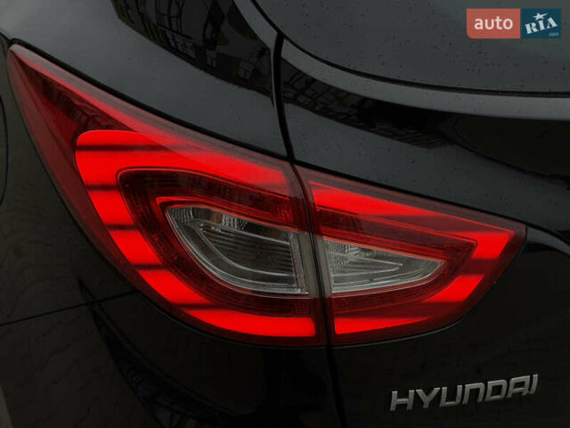 Чорний Хендай іх35, об'ємом двигуна 2 л та пробігом 240 тис. км за 15800 $, фото 11 на Automoto.ua