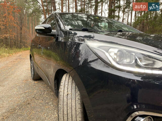Чорний Хендай іх35, об'ємом двигуна 2 л та пробігом 160 тис. км за 15599 $, фото 35 на Automoto.ua