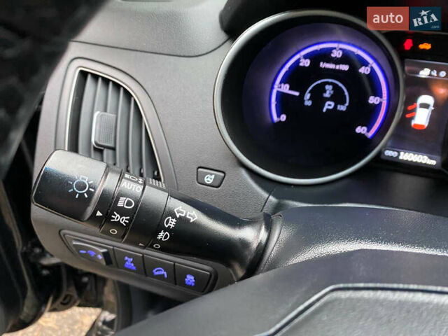 Чорний Хендай іх35, об'ємом двигуна 2 л та пробігом 160 тис. км за 15599 $, фото 49 на Automoto.ua