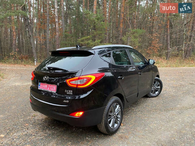 Чорний Хендай іх35, об'ємом двигуна 2 л та пробігом 160 тис. км за 15599 $, фото 12 на Automoto.ua