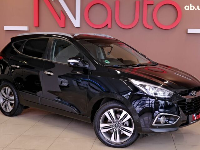 Чорний Хендай іх35, об'ємом двигуна 2 л та пробігом 182 тис. км за 15500 $, фото 3 на Automoto.ua