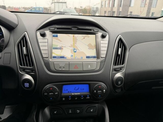 Чорний Хендай іх35, об'ємом двигуна 2 л та пробігом 240 тис. км за 14999 $, фото 11 на Automoto.ua